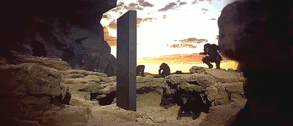 apes surround monolith in movie 2001