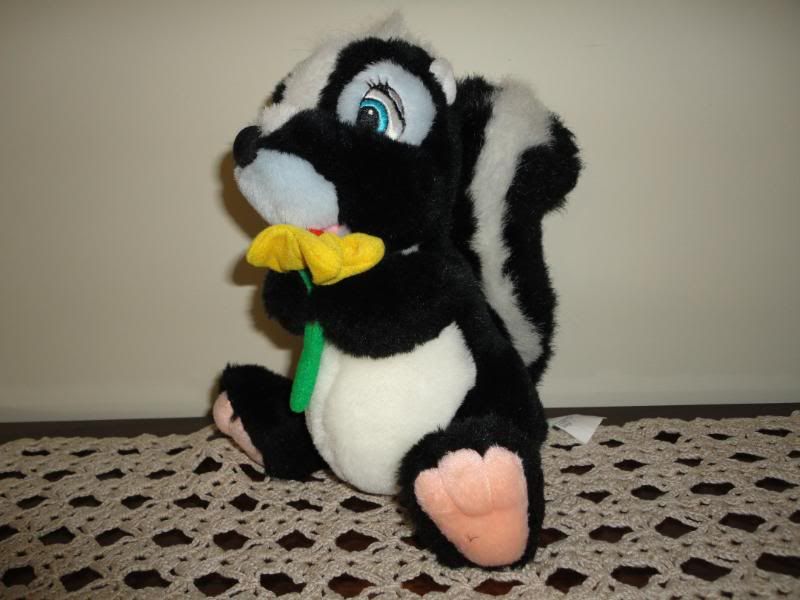 flower the skunk stuffed animal