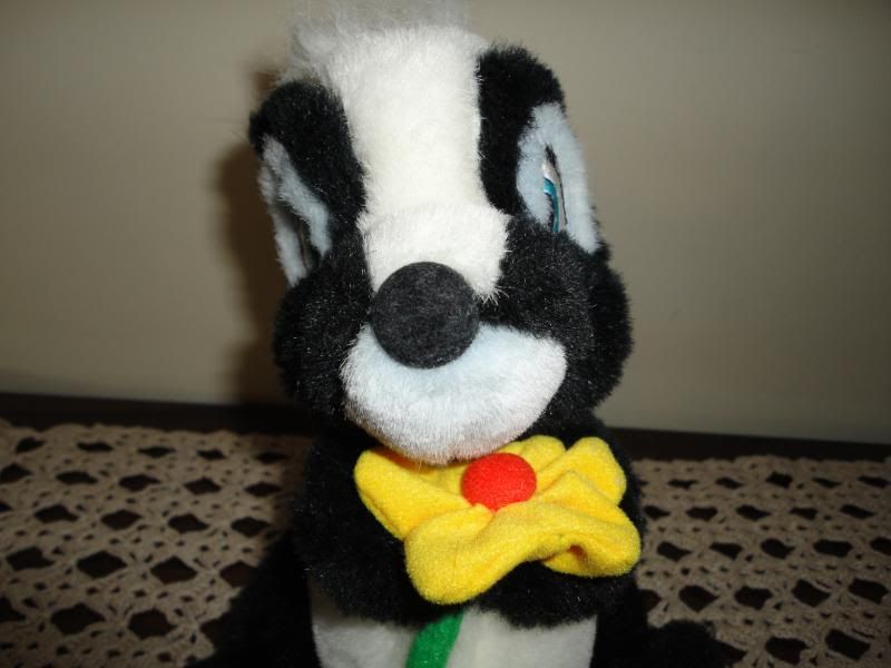 flower the skunk stuffed animal