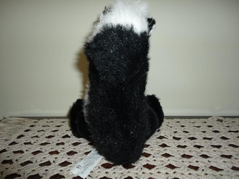 flower the skunk stuffed animal